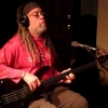 Alan in the studio on fretless electric bass